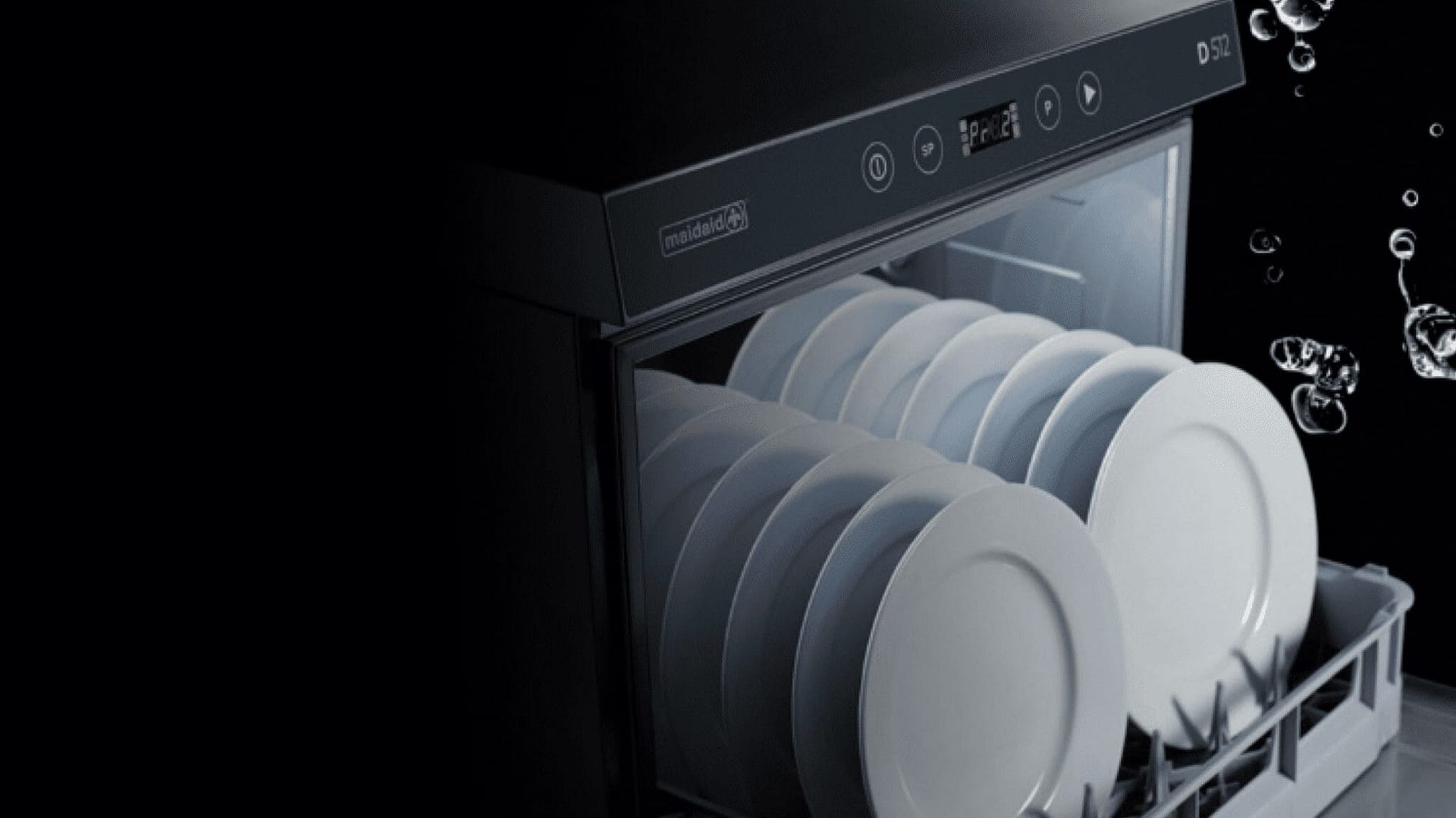 Dishwasher with clean white plates drying after wash cycle.
